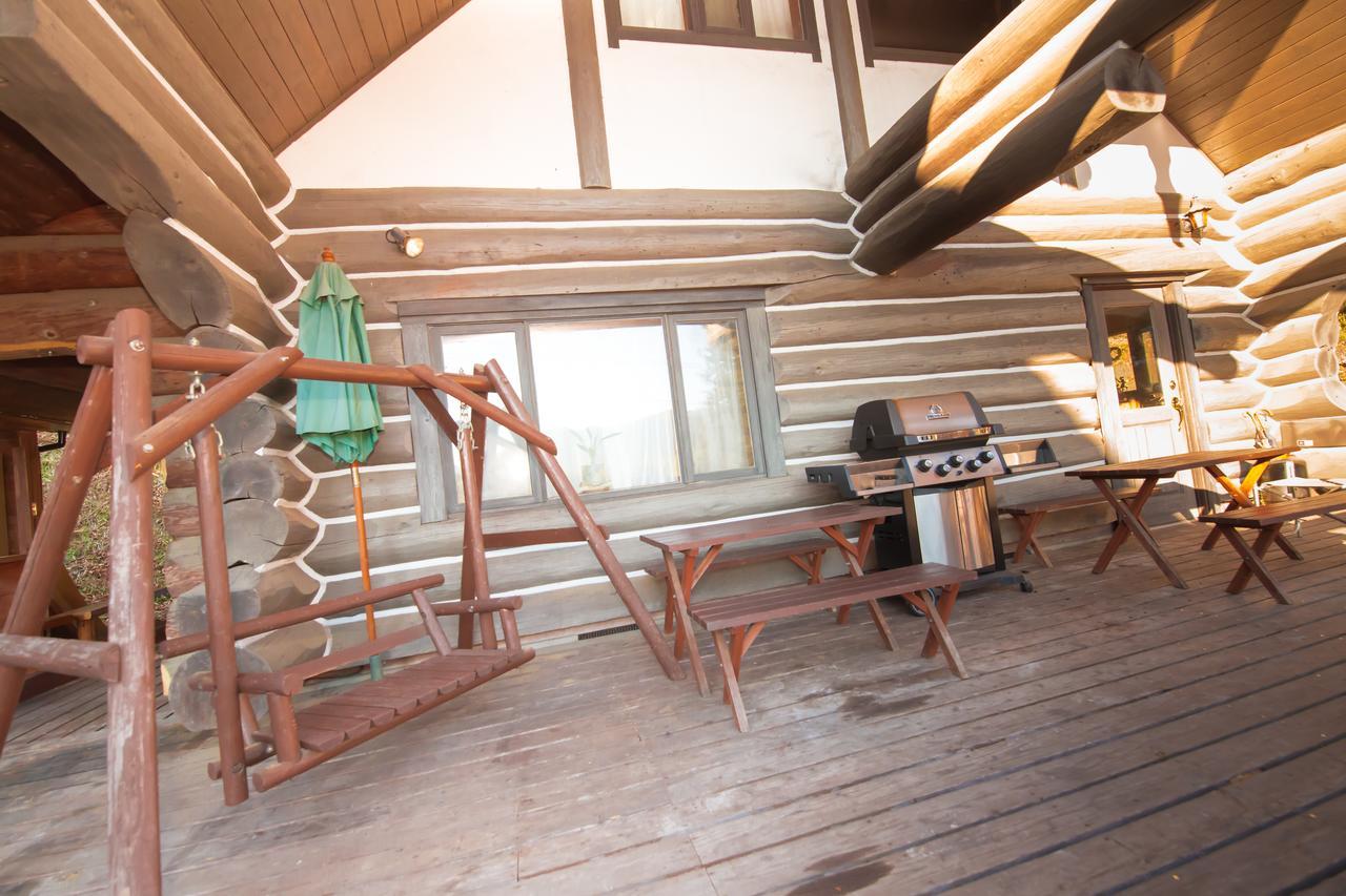 فندق Yufuin Log House No Yado Tom Sawyer المظهر الخارجي الصورة